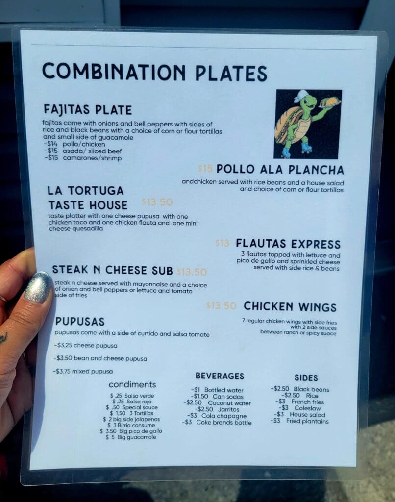 A restaurant menu board displaying combination plates and food items with descriptions and pricing information.