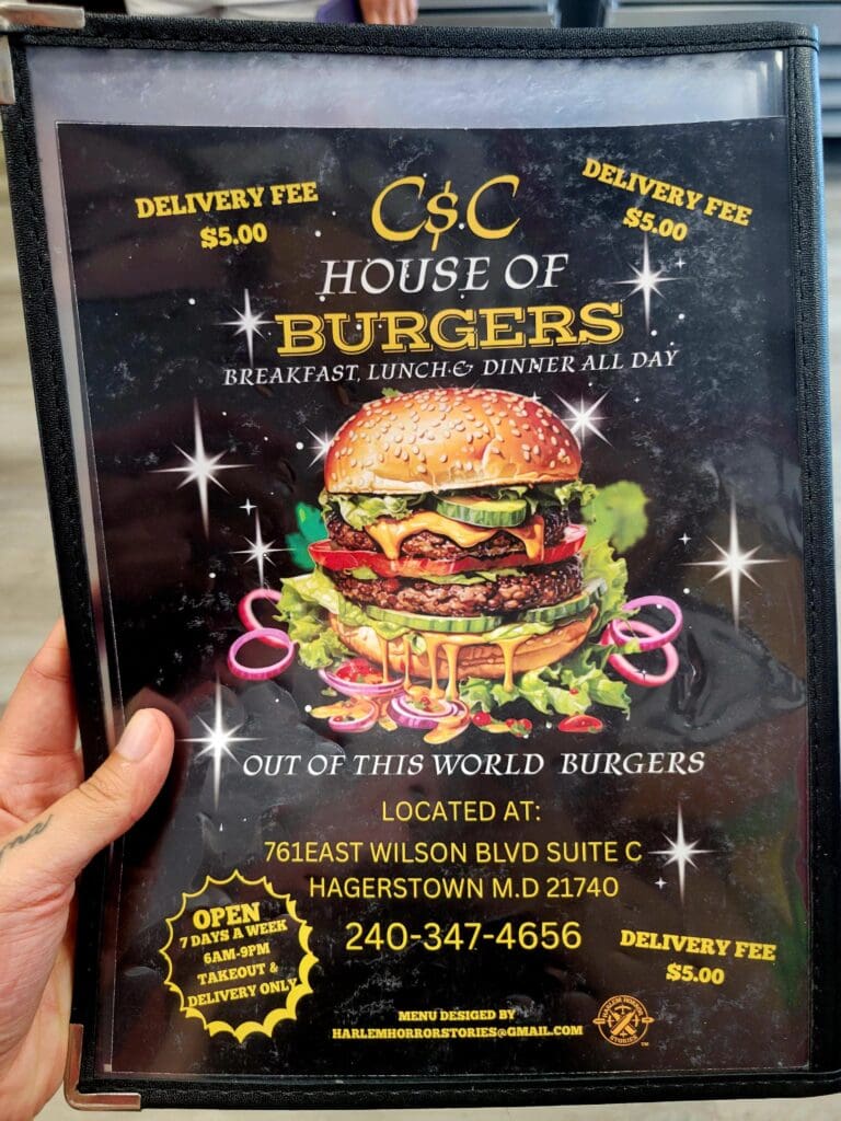 A promotional flyer for C&C House of Burgers featuring a gourmet burger image with gold text on a black background and delivery information.