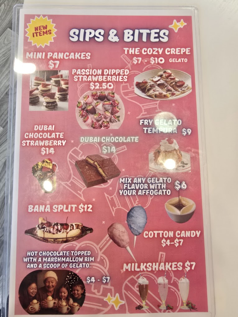 A pink-themed dessert and beverage menu board displaying items like the Cozy Crepe, Passion Poppet, Dara Chocolate Dream, and various milkshakes with prices ranging from $4 to $10.